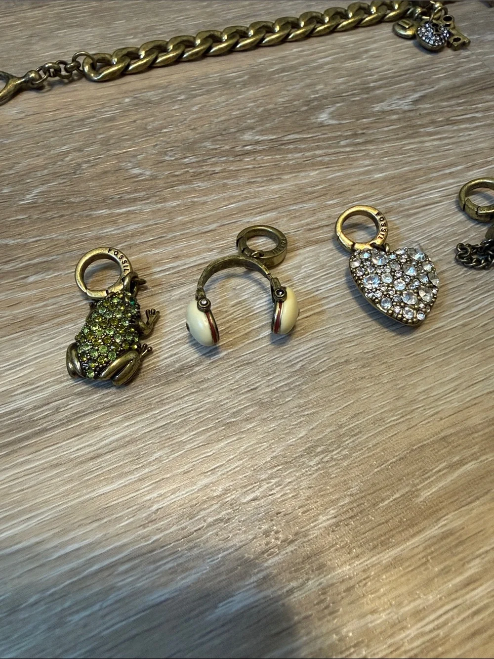 Fossil Gold Tone Charm Bracelet 5 Charms Toggle Metal Retired
